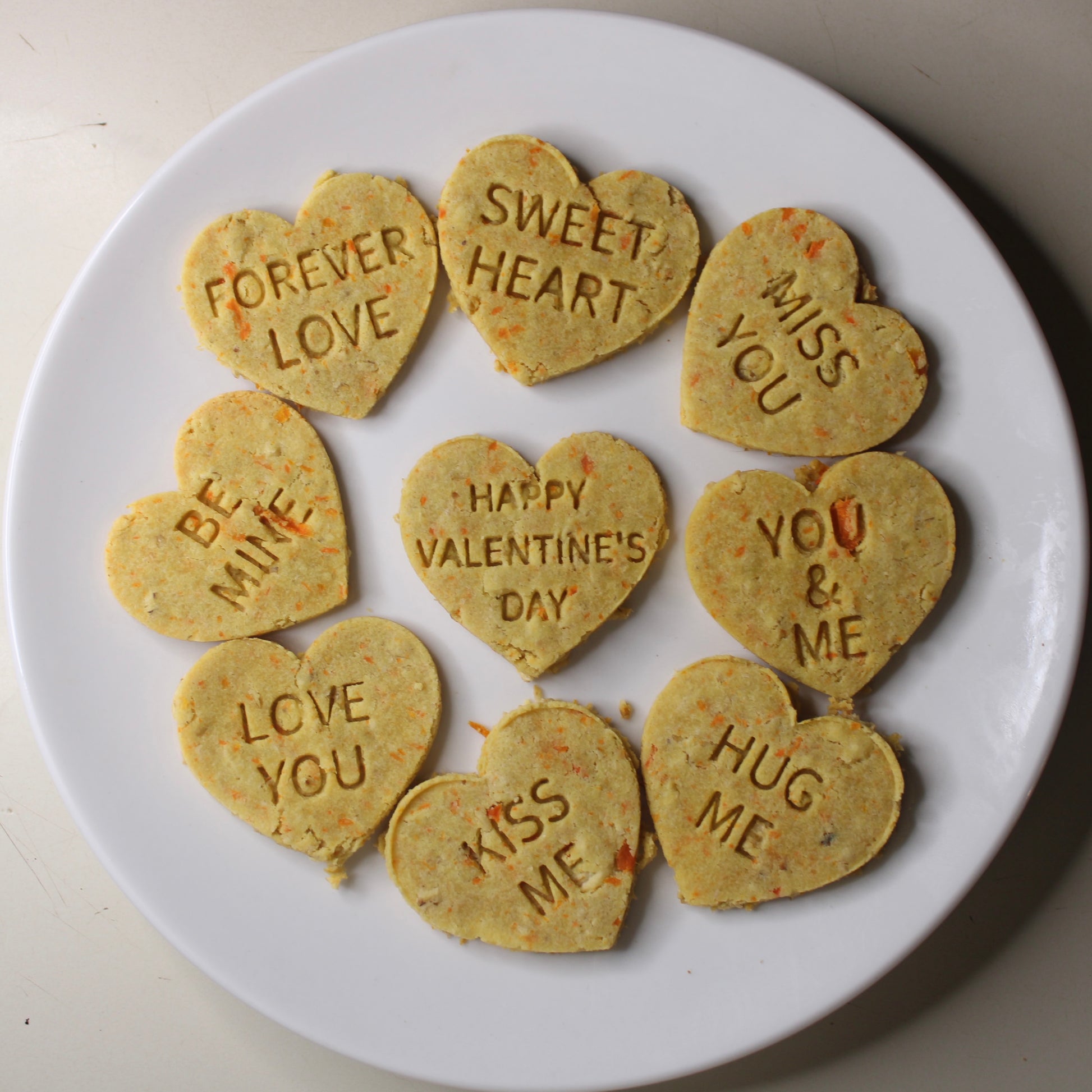 heart shaped dog treats with valentine's day sayings